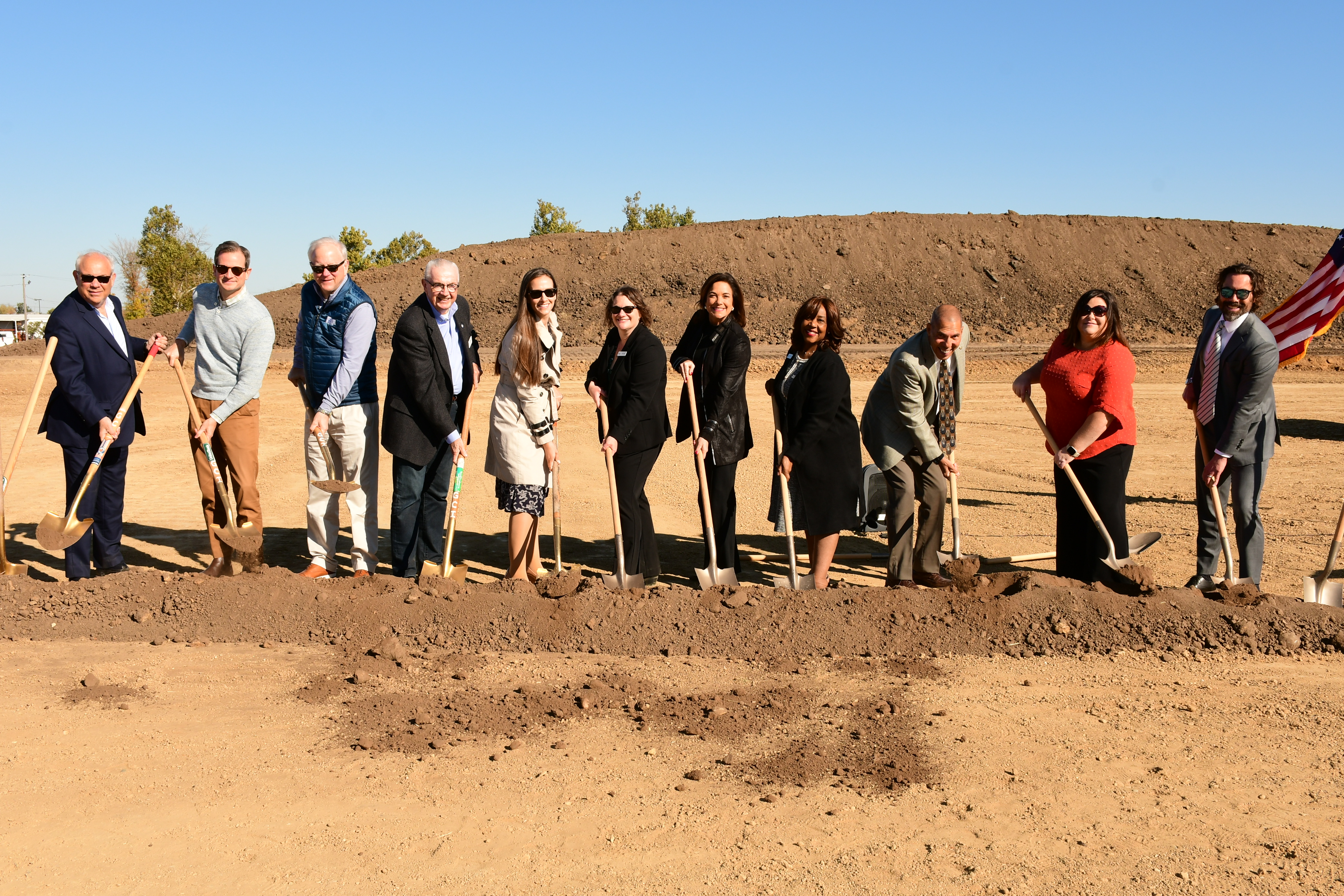 City officials break ground on a new library.