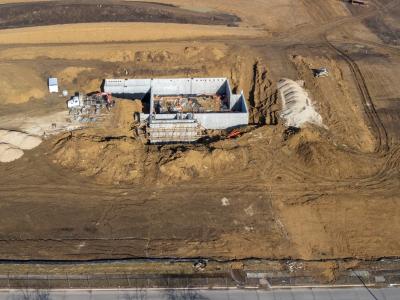 Image of the new westside library construction site where you see basement being dug