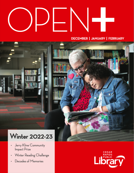 The cover of OPEN+ magazine has a red border and a photo of a white haired woman sitting next to her granddaughter as they read a book.