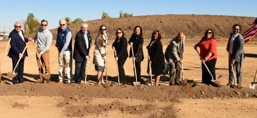 City officials break ground on a new library.