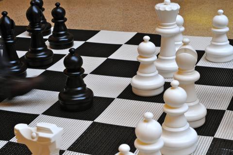 Chess board with black and white pieces